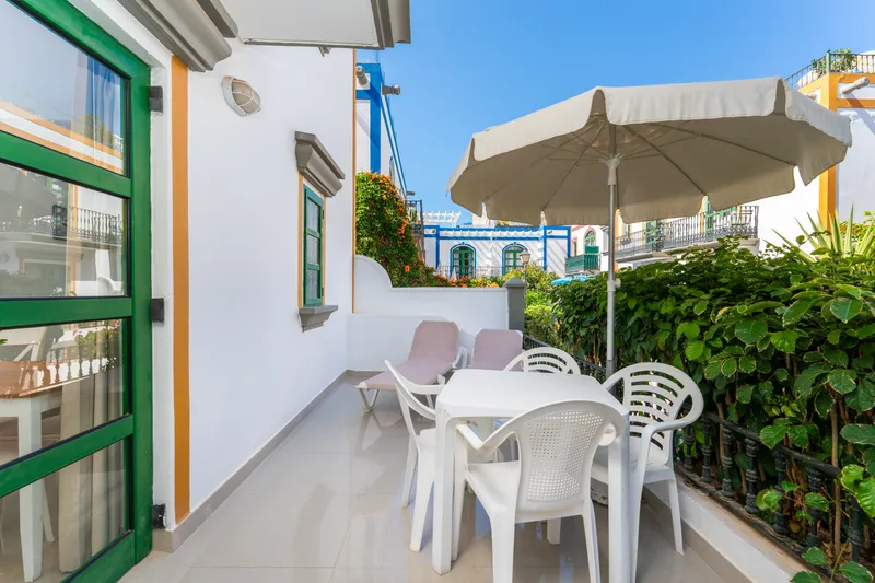 Apto. 2 dorm. En planta baja con terraza — Billy's Puerto de Mogan Apartments by LIVVO, Puerto de Mogán 1